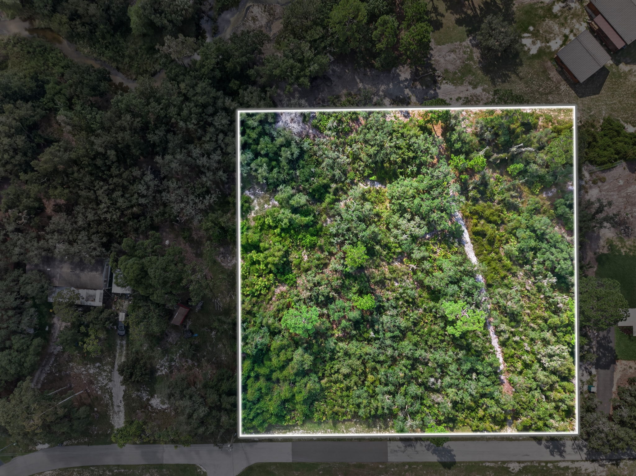 Top-down aerial of the lot with the boundary outlined